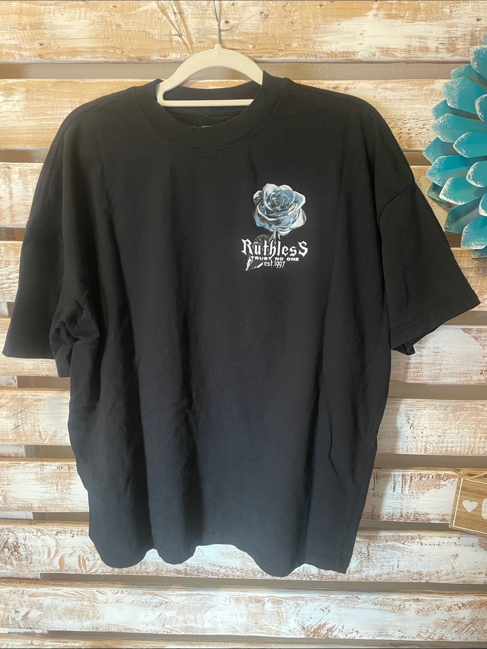 On The Low (OTL)  black graphic t-shirt featuring a "Ruthless"  l Size Small